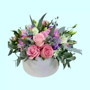 Caja Redonda Primaveral con rosas lisianthus y alstroemerias
