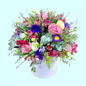 Primavera Redondo arreglo con rosas lisianthus y alstroemerias