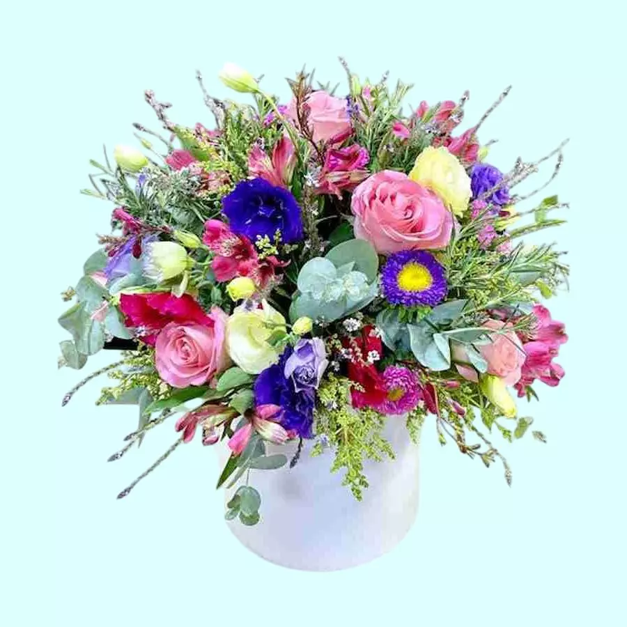 Primavera Redondo arreglo con rosas lisianthus y alstroemerias
