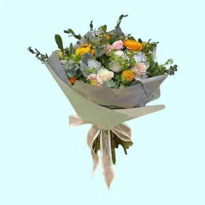 Ilusión ramo de rosas gerberas y claveles en tonos naranja y rosa