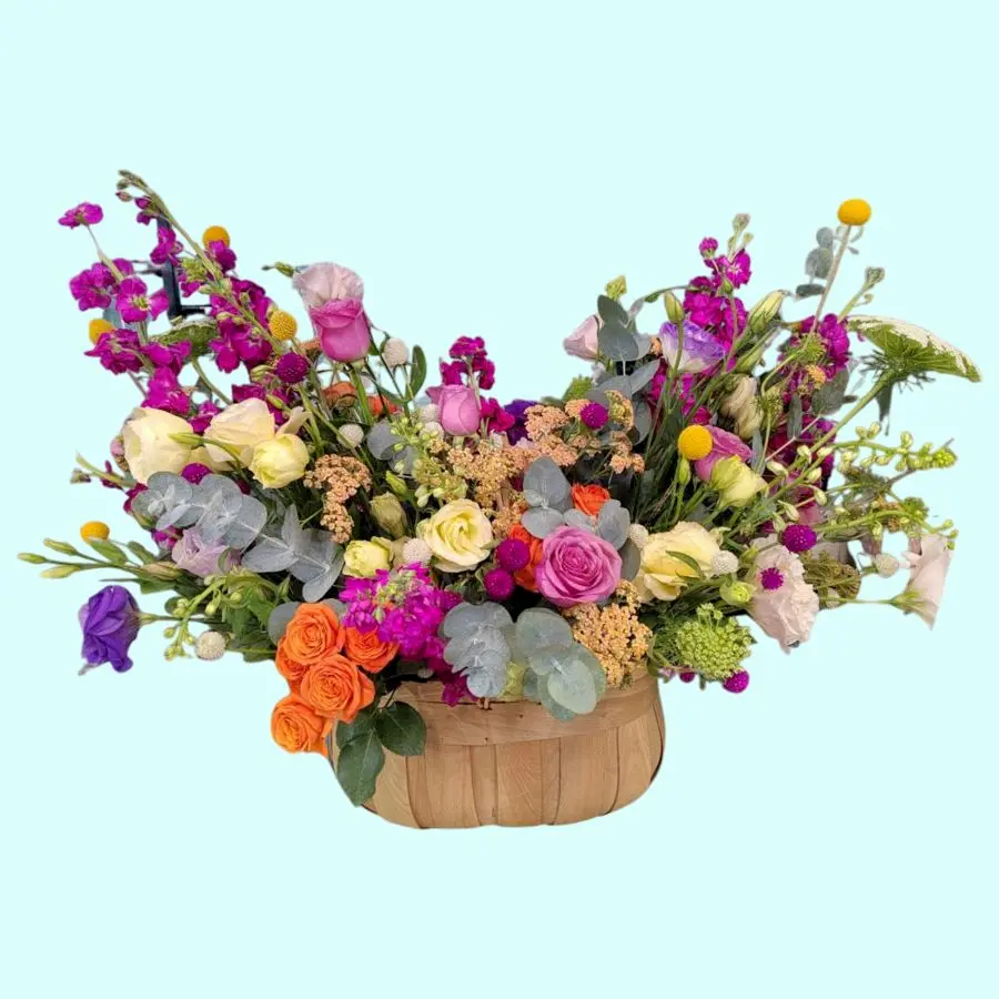 Lealtad canasta premium con rosas gerberas y lilis